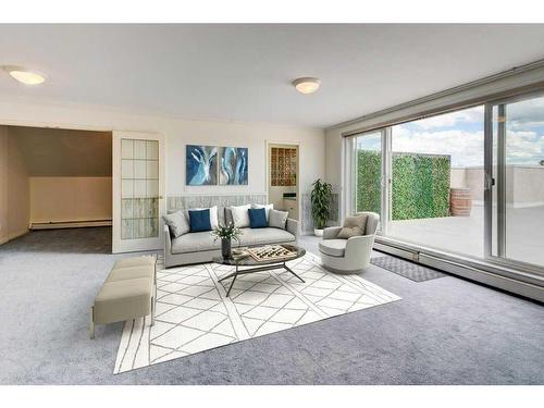 301-705 56 Avenue Sw, Calgary, AB - Indoor Photo Showing Living Room