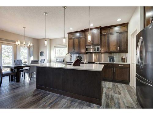 14 Chapalina Green Se, Calgary, AB - Indoor Photo Showing Kitchen With Upgraded Kitchen