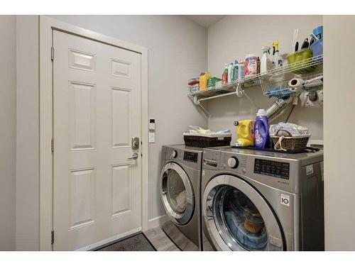 14 Chapalina Green Se, Calgary, AB - Indoor Photo Showing Laundry Room