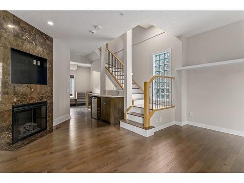 1303 7 Street Sw, Calgary, AB - Indoor Photo Showing Living Room With Fireplace