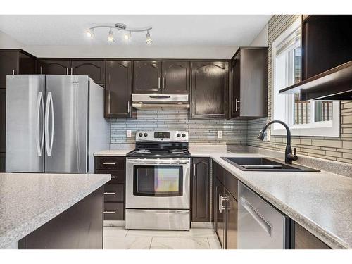 274 Covewood Park Ne, Calgary, AB - Indoor Photo Showing Kitchen With Double Sink With Upgraded Kitchen