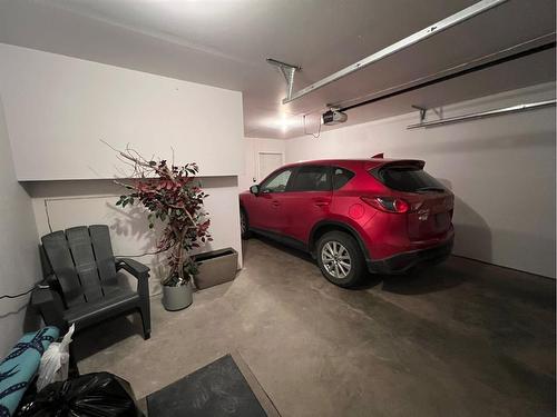 802 Prairie Sound Circle Nw, High River, AB - Indoor Photo Showing Garage