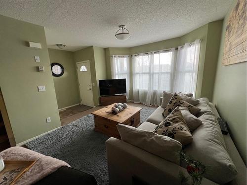 802 Prairie Sound Circle Nw, High River, AB - Indoor Photo Showing Living Room