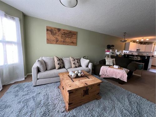 802 Prairie Sound Circle Nw, High River, AB - Indoor Photo Showing Living Room