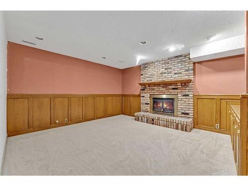 44 Edgepark Court Nw, Calgary, AB - Indoor With Fireplace