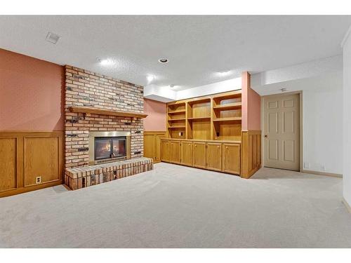 44 Edgepark Court Nw, Calgary, AB - Indoor With Fireplace