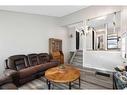 32 Maplewood Green, Strathmore, AB  - Indoor Photo Showing Living Room 