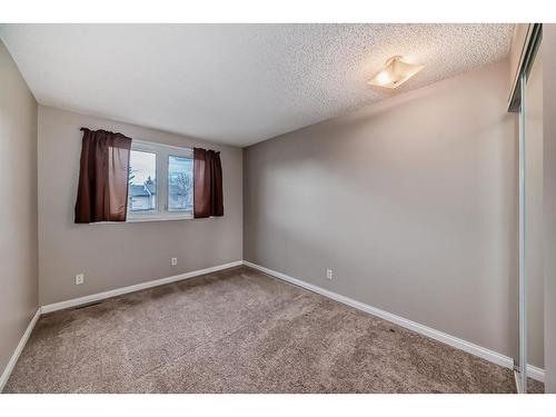 702-360 Falconridge Crescent Ne, Calgary, AB - Indoor Photo Showing Other Room