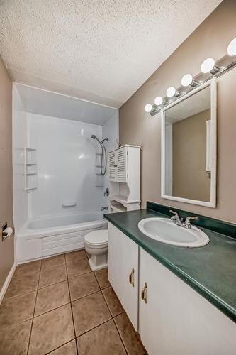 702-360 Falconridge Crescent Ne, Calgary, AB - Indoor Photo Showing Bathroom