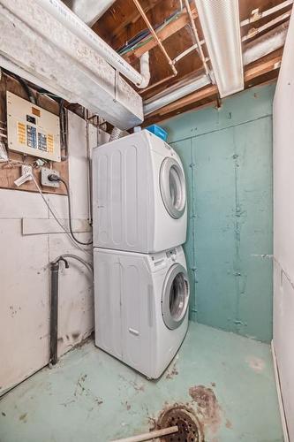 702-360 Falconridge Crescent Ne, Calgary, AB - Indoor Photo Showing Laundry Room