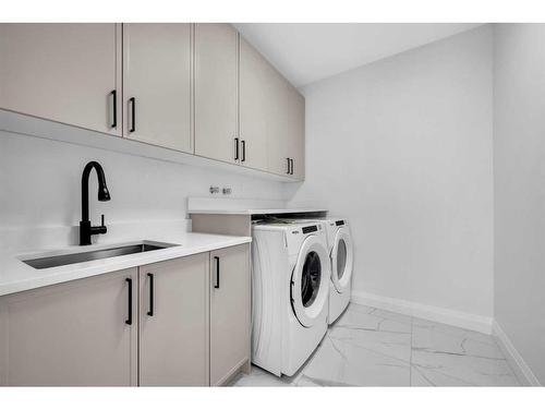 2020 Waterbury Road, Chestermere, AB - Indoor Photo Showing Laundry Room