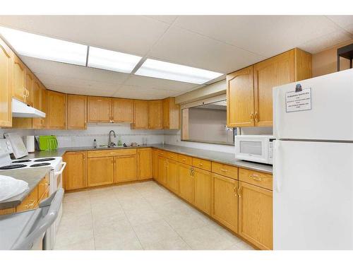 249-8535 Bonaventure Drive Se, Calgary, AB - Indoor Photo Showing Kitchen With Double Sink