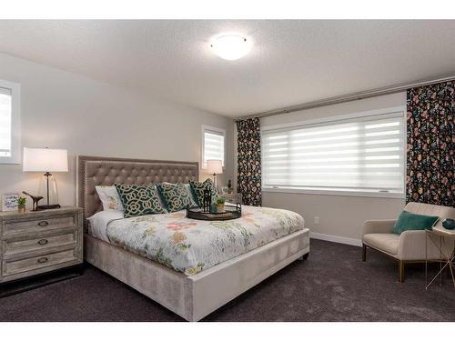 600 Reynolds Crescent Sw, Airdrie, AB - Indoor Photo Showing Bedroom