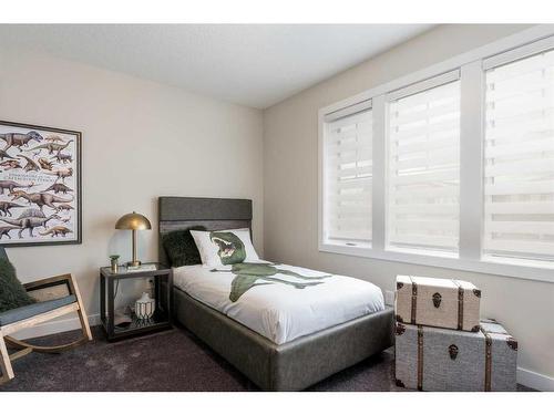 600 Reynolds Crescent Sw, Airdrie, AB - Indoor Photo Showing Bedroom