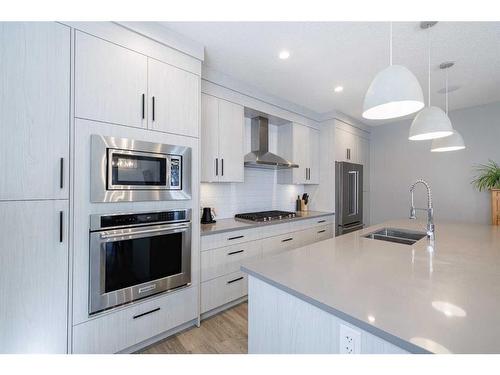 1-138 22 Avenue Ne, Calgary, AB - Indoor Photo Showing Kitchen With Double Sink With Upgraded Kitchen