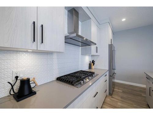 1-138 22 Avenue Ne, Calgary, AB - Indoor Photo Showing Kitchen With Upgraded Kitchen