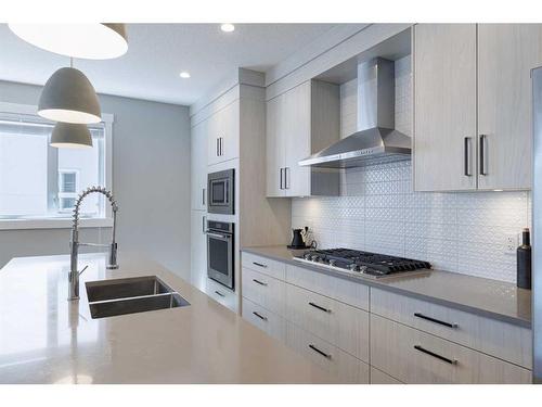 1-138 22 Avenue Ne, Calgary, AB - Indoor Photo Showing Kitchen With Double Sink With Upgraded Kitchen