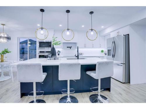 122 Saddlecrest Landing Ne, Calgary, AB - Indoor Photo Showing Kitchen With Upgraded Kitchen