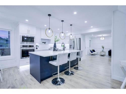 122 Saddlecrest Landing Ne, Calgary, AB - Indoor Photo Showing Kitchen With Upgraded Kitchen