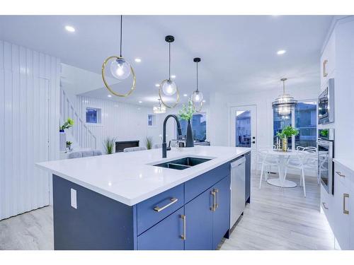 122 Saddlecrest Landing Ne, Calgary, AB - Indoor Photo Showing Kitchen With Double Sink With Upgraded Kitchen