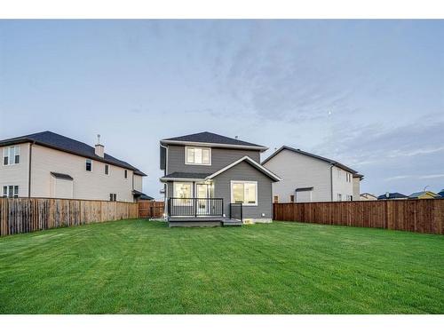 122 Saddlecrest Landing Ne, Calgary, AB - Outdoor With Backyard With Exterior