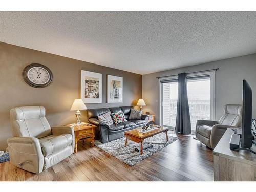 2413-6224 17 Avenue Se, Calgary, AB - Indoor Photo Showing Living Room