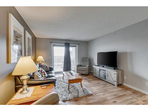 2413-6224 17 Avenue Se, Calgary, AB - Indoor Photo Showing Living Room