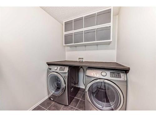 157 Kincora Cove Nw, Calgary, AB - Indoor Photo Showing Laundry Room