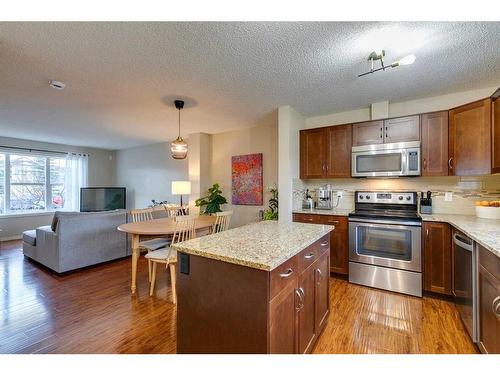 73 Silverado Drive Sw, Calgary, AB - Indoor Photo Showing Kitchen With Stainless Steel Kitchen