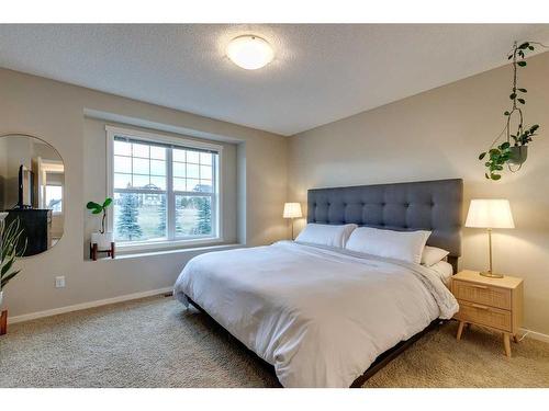 73 Silverado Drive Sw, Calgary, AB - Indoor Photo Showing Bedroom