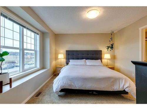 73 Silverado Drive Sw, Calgary, AB - Indoor Photo Showing Bedroom