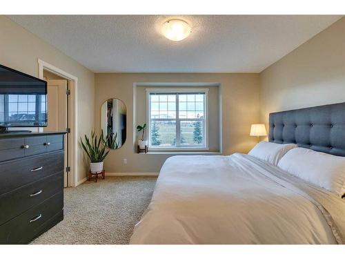 73 Silverado Drive Sw, Calgary, AB - Indoor Photo Showing Bedroom