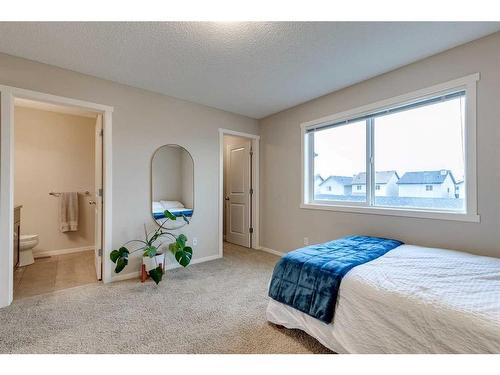 73 Silverado Drive Sw, Calgary, AB - Indoor Photo Showing Bedroom