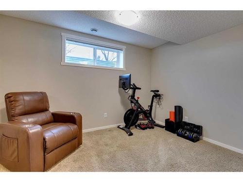 73 Silverado Drive Sw, Calgary, AB - Indoor Photo Showing Gym Room