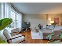 73 Silverado Drive Sw, Calgary, AB  - Indoor Photo Showing Living Room 