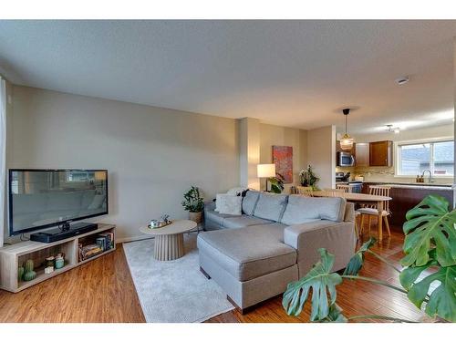 73 Silverado Drive Sw, Calgary, AB - Indoor Photo Showing Living Room