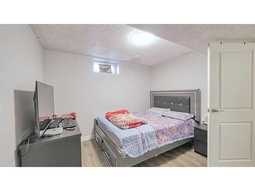 56 Tararidge Drive Ne, Calgary, AB - Indoor Photo Showing Bedroom