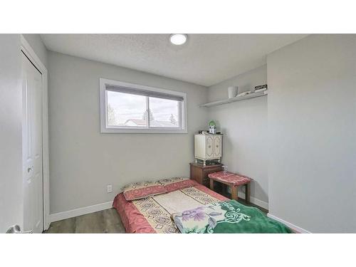 56 Tararidge Drive Ne, Calgary, AB - Indoor Photo Showing Bedroom