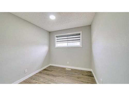 56 Tararidge Drive Ne, Calgary, AB - Indoor Photo Showing Other Room