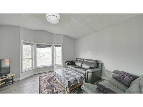 56 Tararidge Drive Ne, Calgary, AB - Indoor Photo Showing Living Room