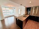 707-888 4 Avenue Sw, Calgary, AB  - Indoor Photo Showing Kitchen With Double Sink 