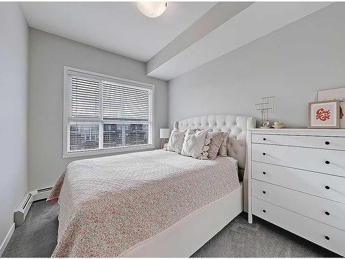 318-4350 Seton Drive Se, Calgary, AB - Indoor Photo Showing Bedroom