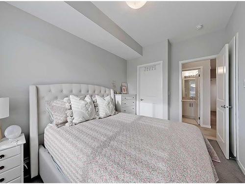 318-4350 Seton Drive Se, Calgary, AB - Indoor Photo Showing Bedroom