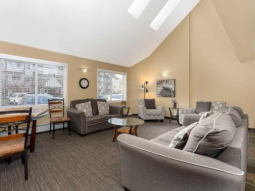 1111-200 Community, Okotoks, AB - Indoor Photo Showing Living Room