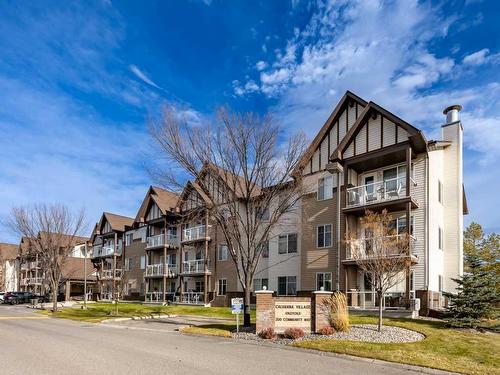 1111-200 Community, Okotoks, AB - Outdoor With Facade