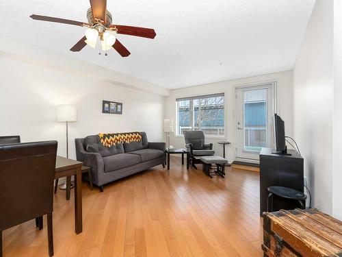 1111-200 Community, Okotoks, AB - Indoor Photo Showing Living Room