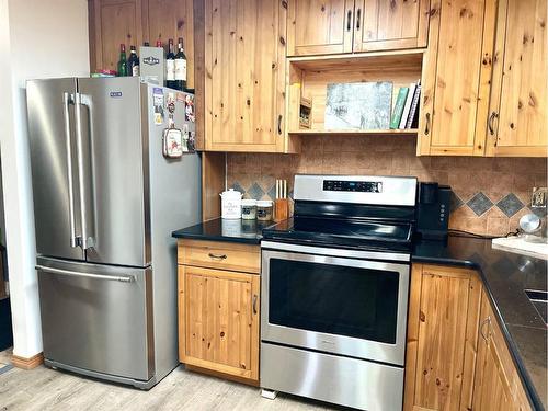 8130 722 Avenue East, Rural Foothills County, AB - Indoor Photo Showing Kitchen With Stainless Steel Kitchen