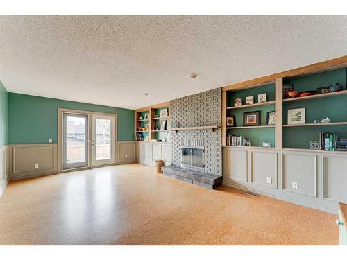 228 Macewan Glen Place Nw, Calgary, AB - Indoor Photo Showing Living Room With Fireplace