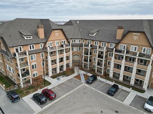 207-30 Mahogany Mews Se, Calgary, AB - Outdoor With Facade