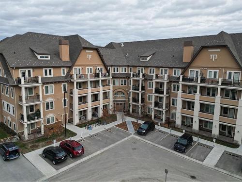 207-30 Mahogany Mews Se, Calgary, AB - Outdoor With Facade